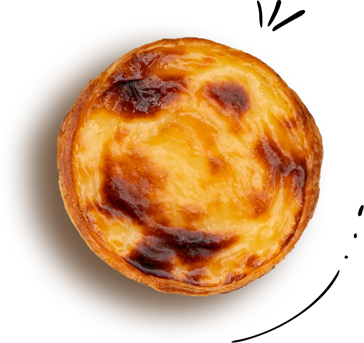 Pastel de nata vu de dessus, avec sa pâte croustillante et son dessus caramélisé